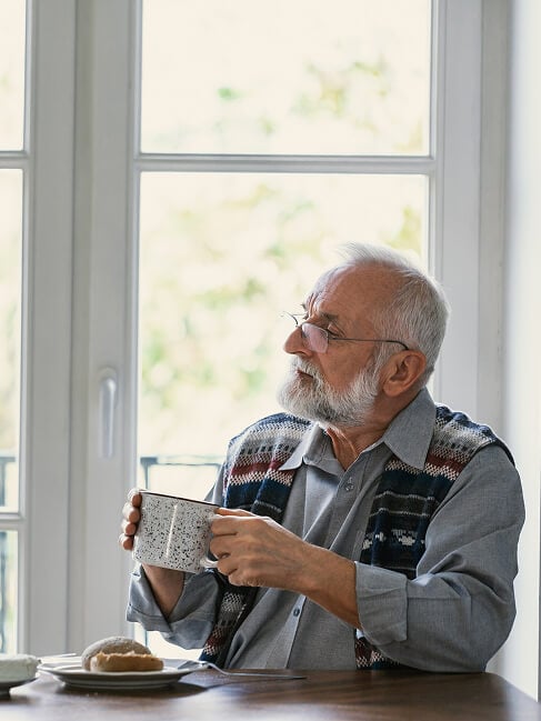 Elderly Man Smiling at Nursing Home in Oxford